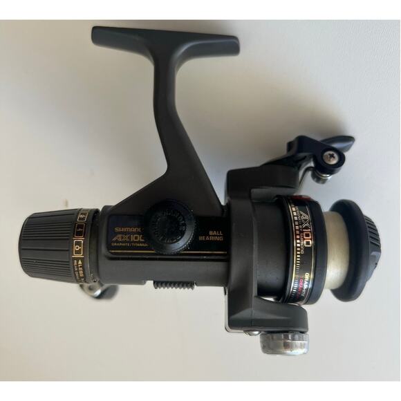 Shimano AX100 QUICK FIRE II FISHING SPINNING REEL Graphite Titanium Ball Bearing - Picture 1 of 5